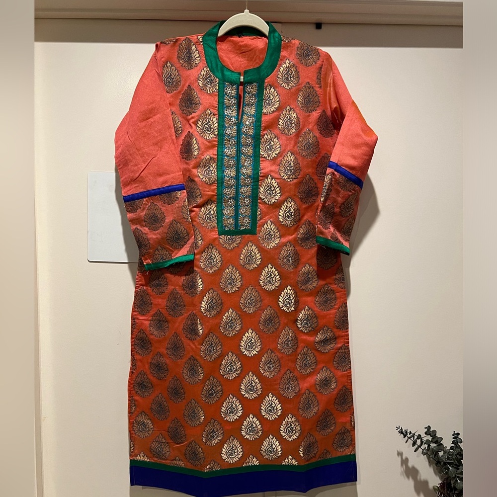 Indian heavy kurti with silk details and rhinestone work